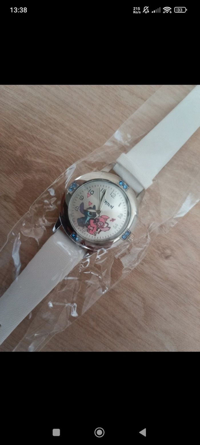 Montre stitch neuve - photo numéro 2
