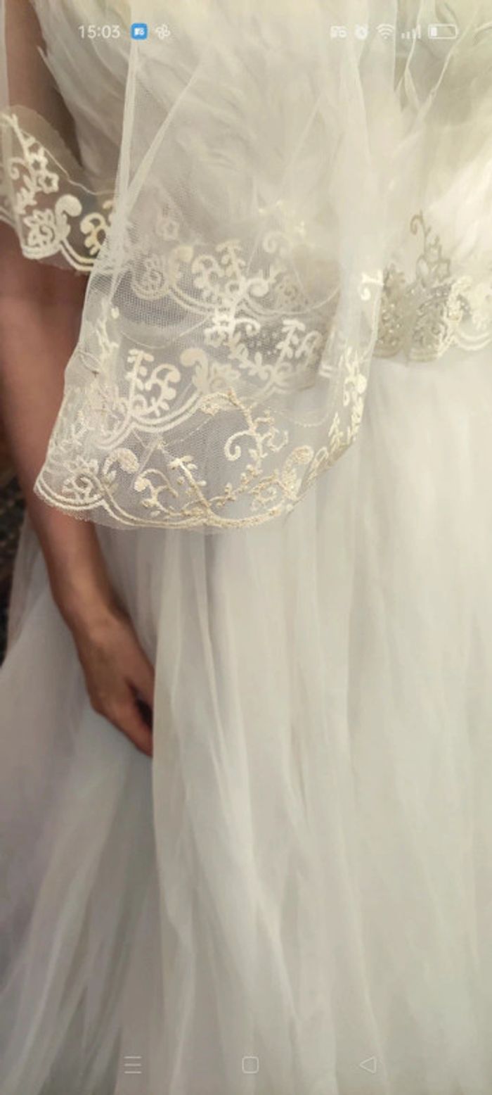 Robe de mariée bustier 36 "princesse" plumes et strass avec traîne et voile - photo numéro 16