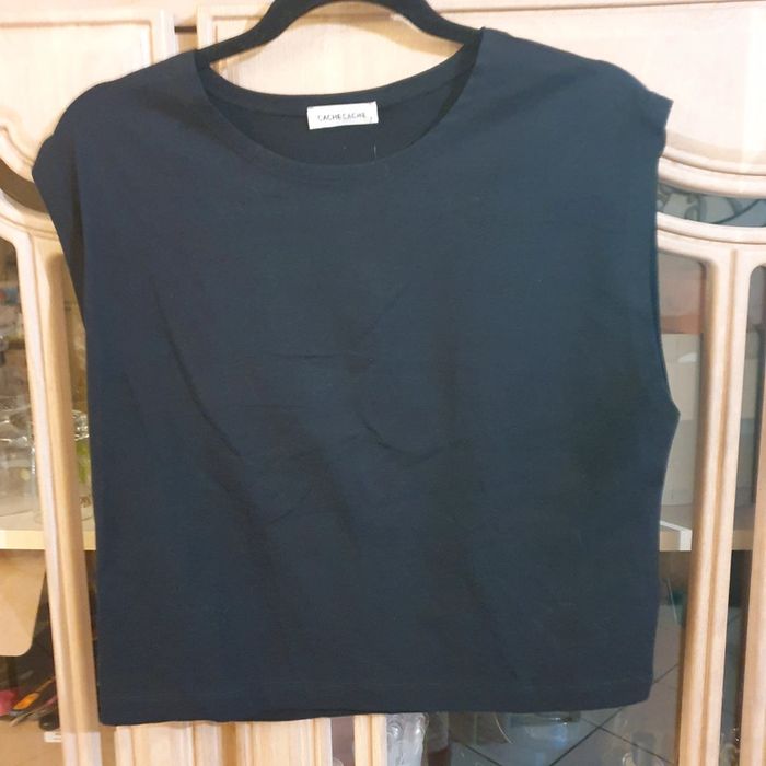 Joli haut noir sans manche taille XL Cache-cache