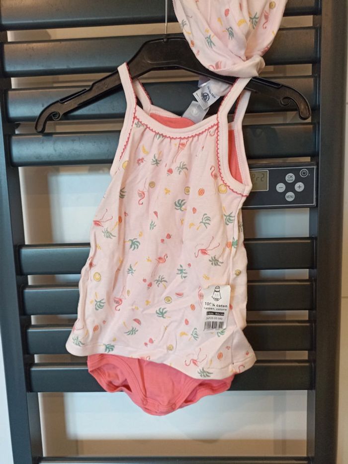 Ensemble barboteuse et bob petit bateau