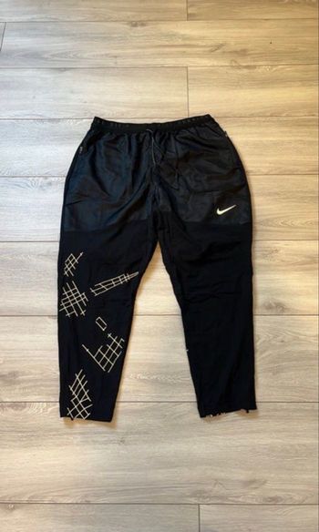 Nike running division araignée