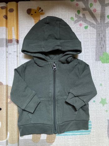 Gilet à zip et capuche