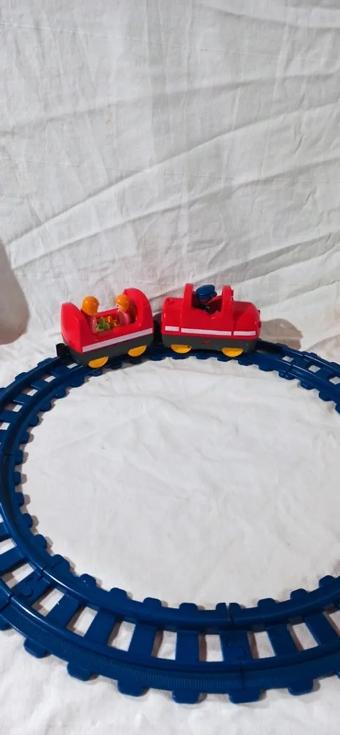 Train avec wagon et voyageurs sur rails playmobil 123