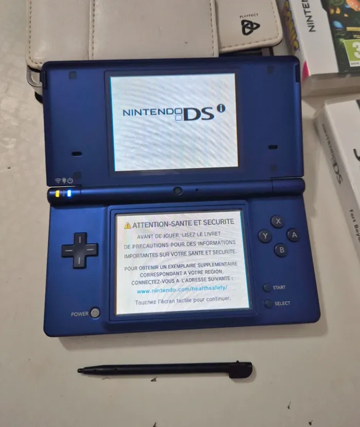 Console Nintendo ds dsi bleu métallisé et jeux - photo numéro 2