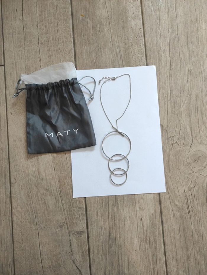 Collier argenté avec 3 anneaux neuf