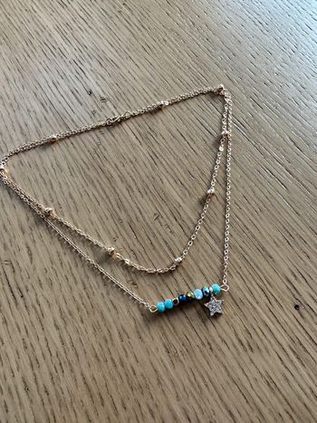Collier multi-rangs doré perles cristal et étoiles strass