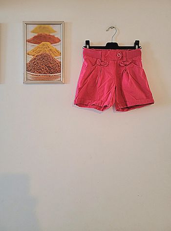 Short léger fuchsia "verbaudet" taille 8 ans