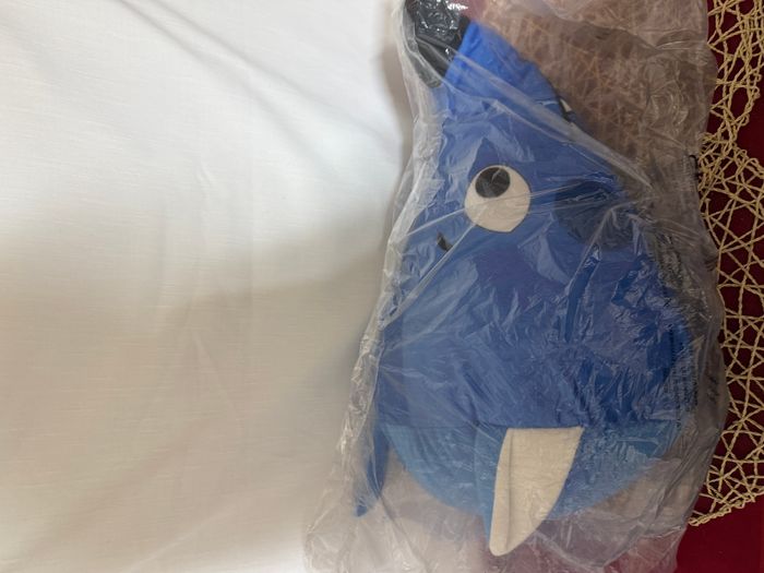 coussin doudou loup bleu non déballé