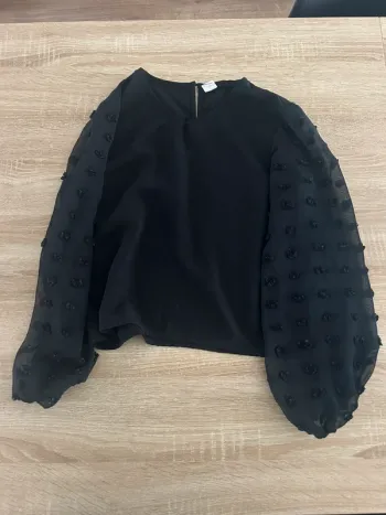 Blouse avec manches transparentes 12 ans