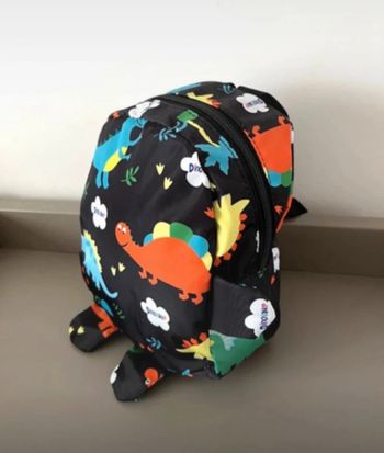 Mignon sac à dos avec dinosaures