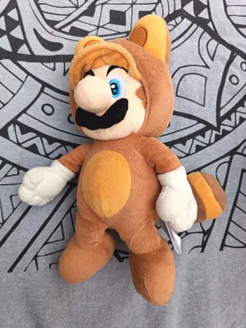 Peluche Mario version panda roux