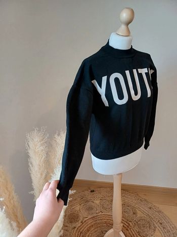 Pull noir chaud avec Écritures Kiabi taille S 36