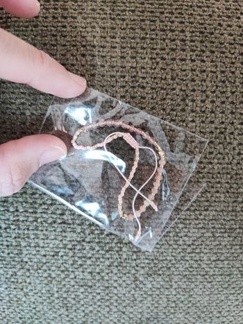 Bracelet réglable perle rose neuf