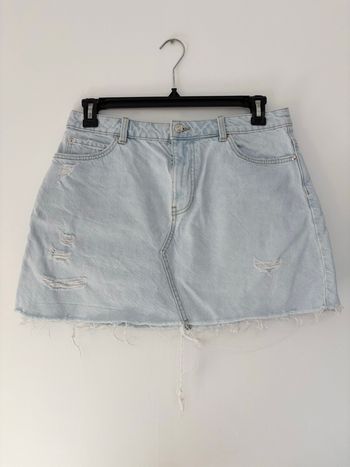 Jupe en jean Zara bleu clair destroy – taille L