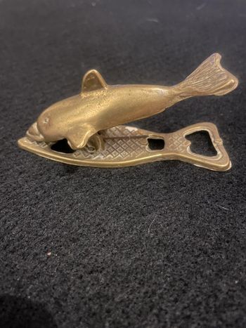 Ouvre bouteille vintage en laiton