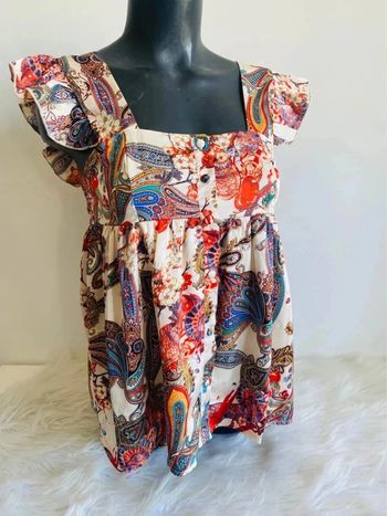 Blouse top type péplum femme taille 36/38 effet satiné