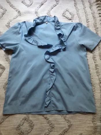Blouse bleue manches courtes taille 38
