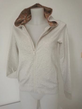 Gilet crème à capuche