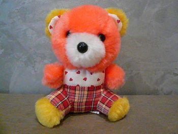Peluche nounours orange et jaune neuve