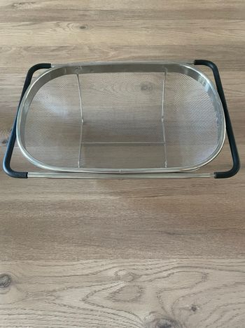 Passoire extensible inoxydable neuve caoutchouc noir