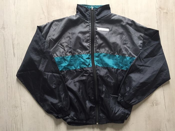 638-Veste de survêtement T 14 ANS