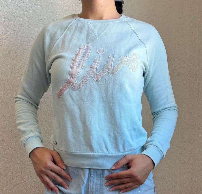 Pull sweat léger col rond Lacoste live bleu clair intérieur polaire devanlay taille S/36