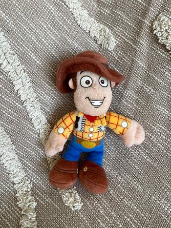 Peluche doudou 21cm Disney Toy story Woody cowboy très bon état