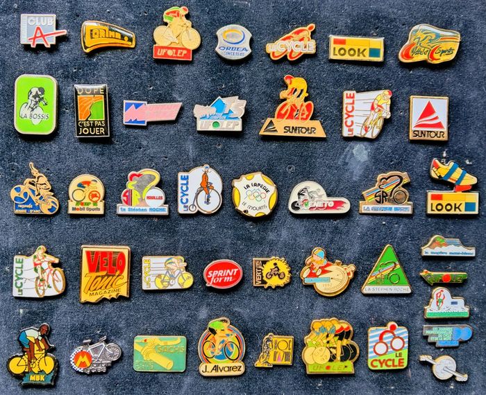 Lot de 41 pin's thème cyclisme, vélo, courses cyclistes