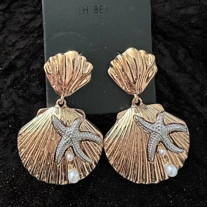 Boucles d’oreilles étoile de mer à perle blanche