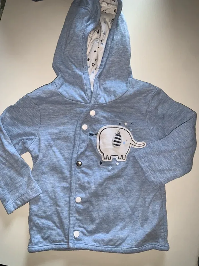 Veste à capuche 6 mois excellent état