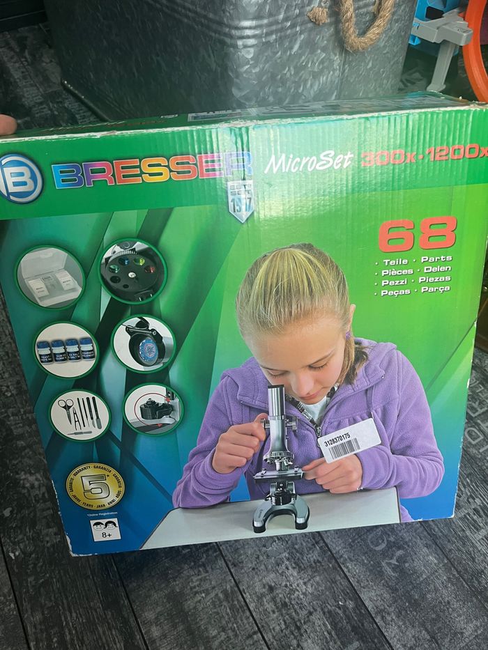 Microscope brasser