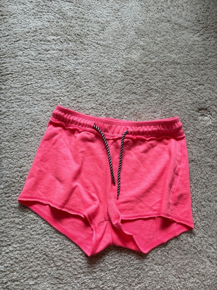 short rose fluo taille 10 ans