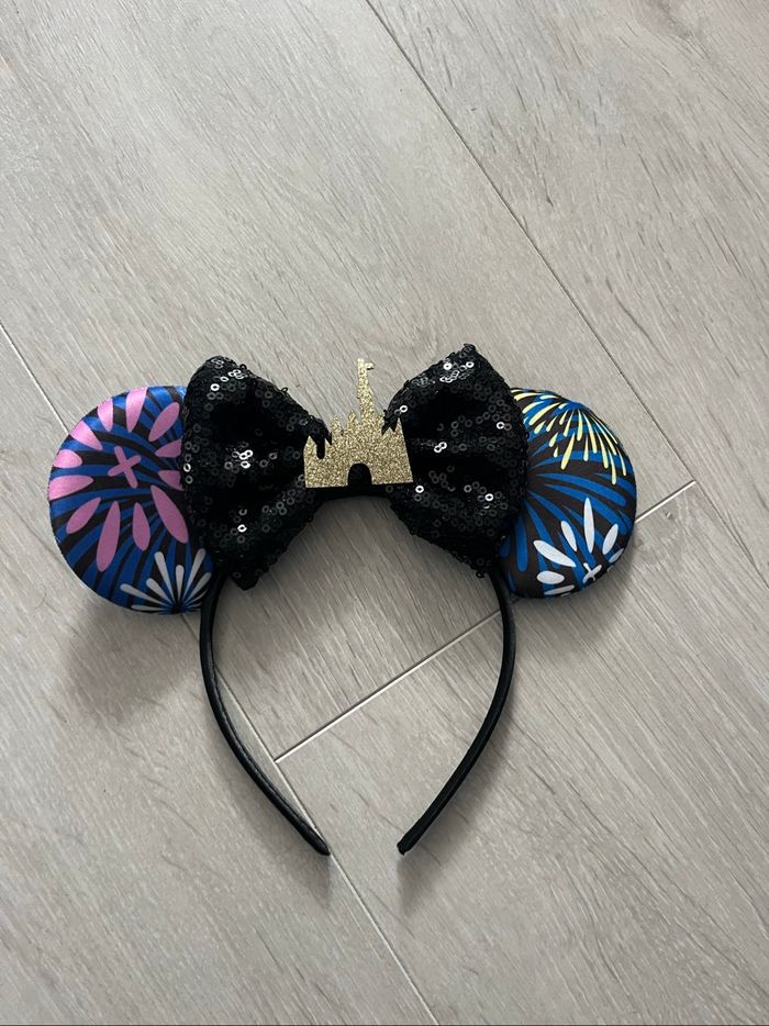 Serre-tête oreilles Minnie Disney – Motif feux d’artifice et nœud sequins noirs