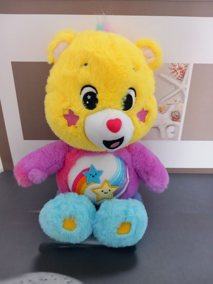 Care bears play by play 2024 
Mesure 34cm