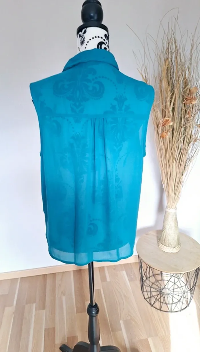 Sublime blouse turquoise sans manches en excellent état - photo numéro 3