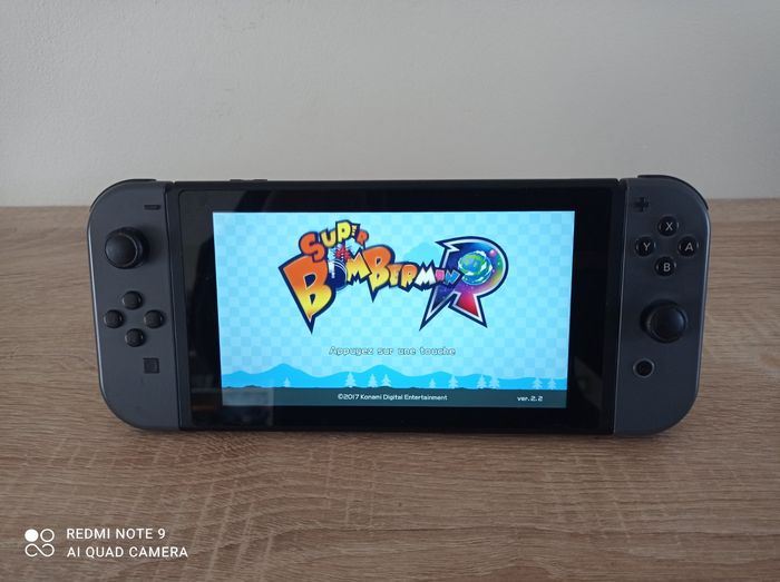 Nintendo switch +5 jeux (splatoon bomberman...)+ manette pro +Chargeur JoyCon - photo numéro 7