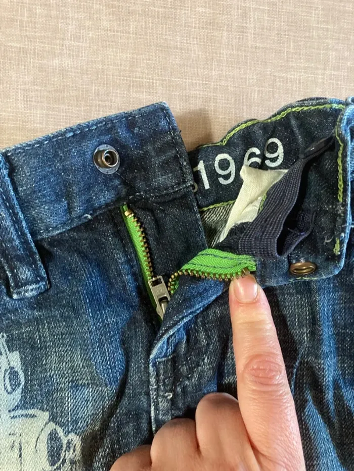 👖 Jean bébé BabyGap 6-12 mois – motif robot 🤖 - photo numéro 3