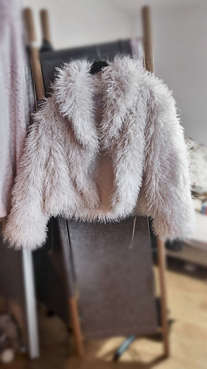 Manteau fausse fourrure