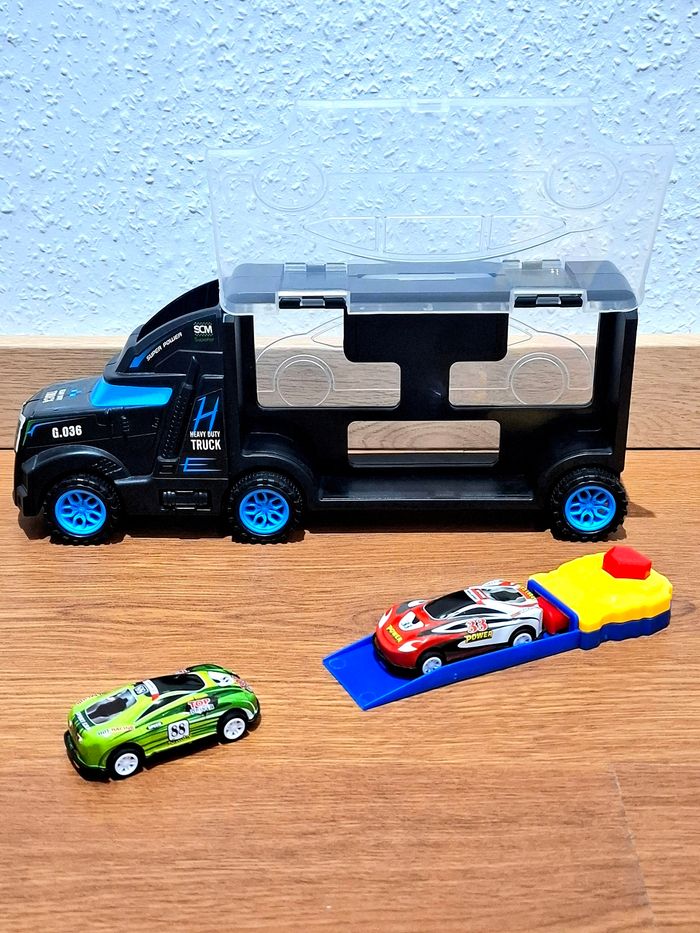 Camion transporteur + 2 voitures de course + propulseur
