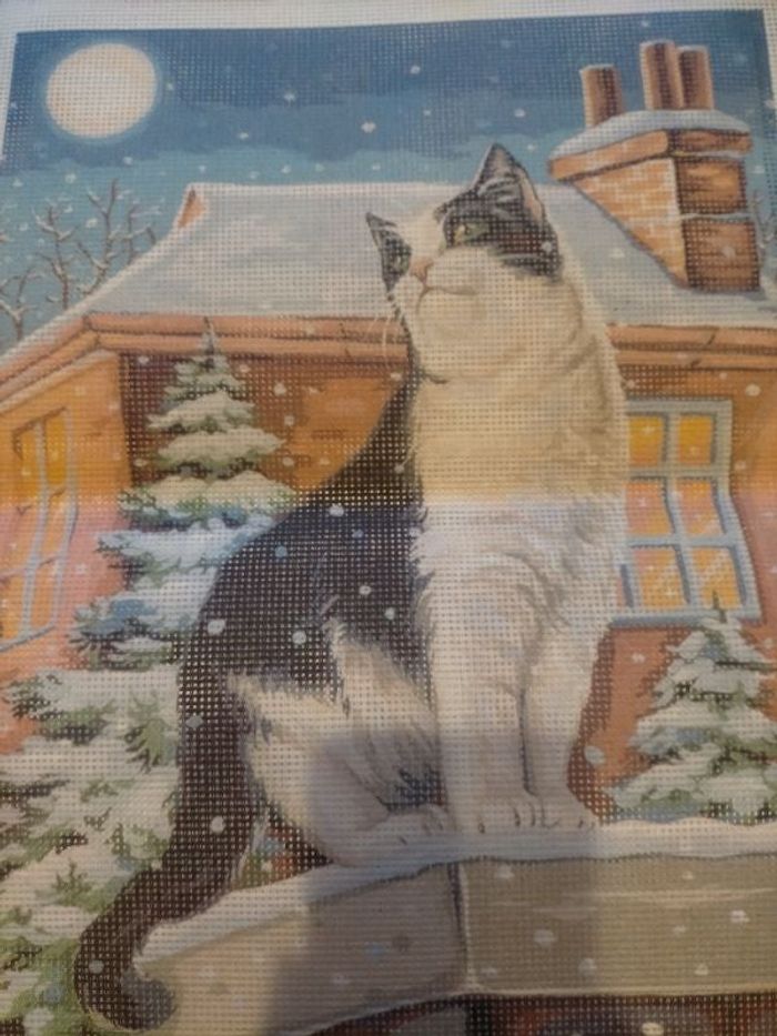 Toile canevas chat sous la neige