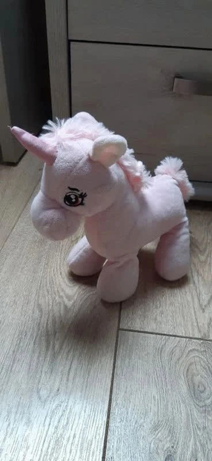 Peluche Licorne rose clair "lg imports" état neuve