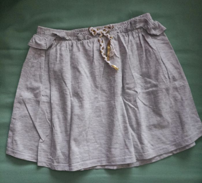 Jupe gris clair 10ans