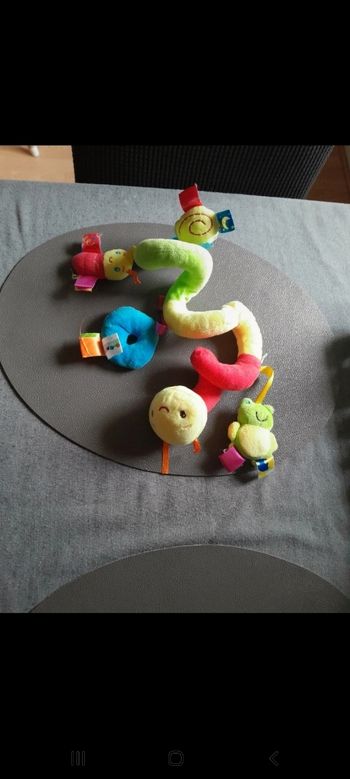 Jouet poussette spirale