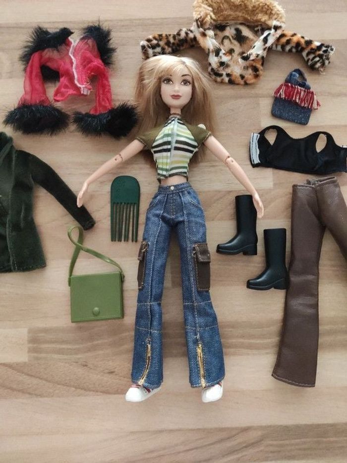 Poupée bratz et nombreux accessoires et vêtements