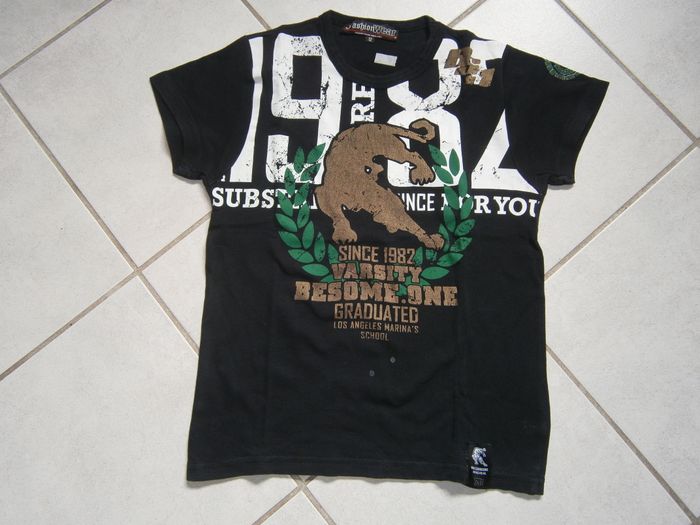 Tee-shirt MC noir motif "Tigre" 12 ans