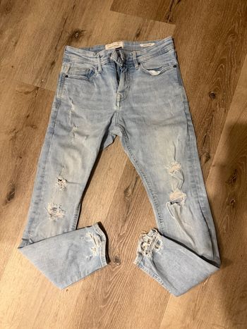 jeans troué 