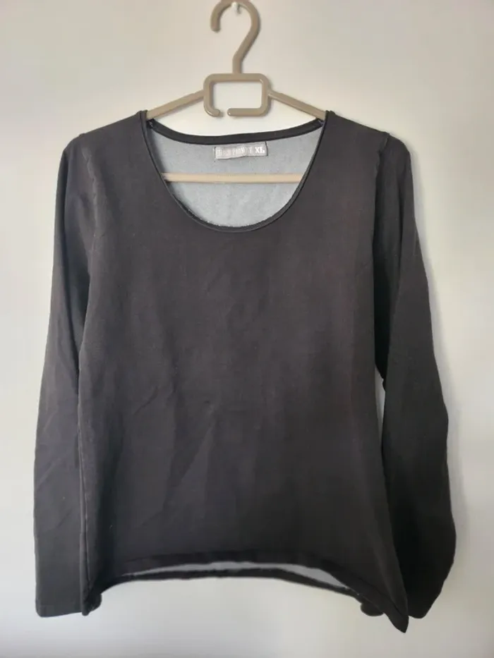 Tee-shirt haut manches longues taille 42 noir en excellent état Chose promise