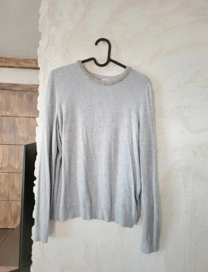 Pull avec collier