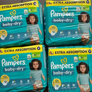 4 paquets de couches  Pampers t 6. Plus