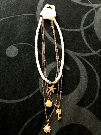 Joli collier multiple